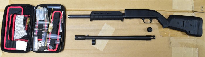 Shotgun Disassembled with Cleaning Kit